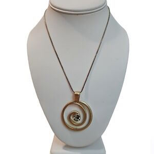 Collectible round pendant necklace by Lia Sophia